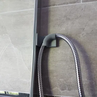 Móc giữ dây sen phòng tắm