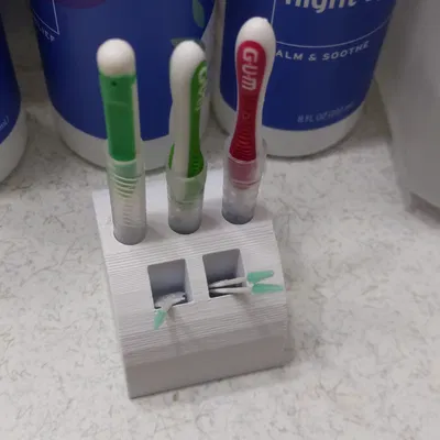 Dụng Cụ Giữ Tăm Xỉa Răng