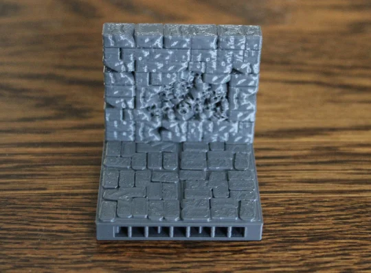 OpenLock: Tấm gạch dungeon tường với đầu lâu chạm khắc 1