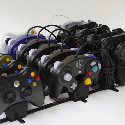 Giá đỡ tay cầm chơi game module cho nhiều hệ máy