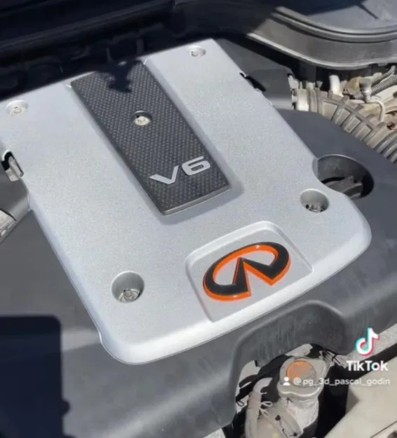 Tem Nắp Capo Infiniti - Image 1