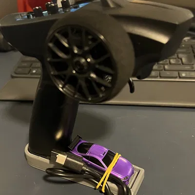 Đế sạc kiêm cất giữ bộ điều khiển Turbo Racing (Không cần keo)