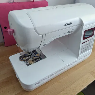 Núm xỏ kim cho máy may Brother Innov-is F400