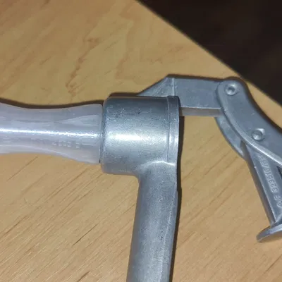 Dụng cụ vệ sinh máy ép tỏi (có tay cầm)