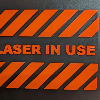 Biển báo "Laser Đang Sử Dụng"