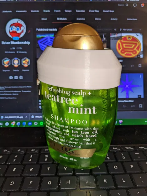 Người giữ dầu gội bạc Ogx Teatree Mint - Image 4