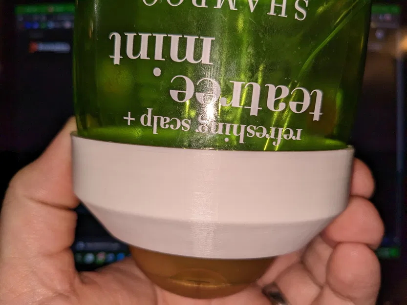 Người giữ dầu gội bạc Ogx Teatree Mint - Image 5