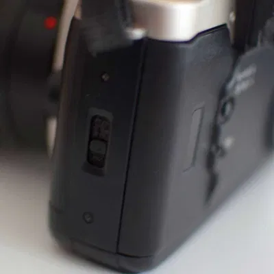 Chốt cửa phim cho Canon EOS 50/50E (Elan/55)