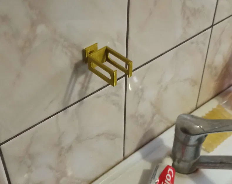 Kệ Đựng Tuýp Kem Đánh Răng - Image 1