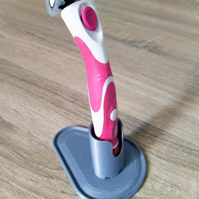 Chân đế dao cạo Schick Quattro Trimstyle