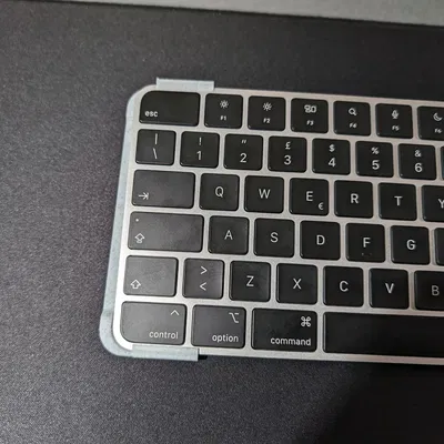 Bàn phím Apple Magic 2-in-1: Raiser và Stand dọc