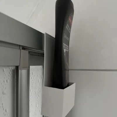 Người giữ chai dầu gội