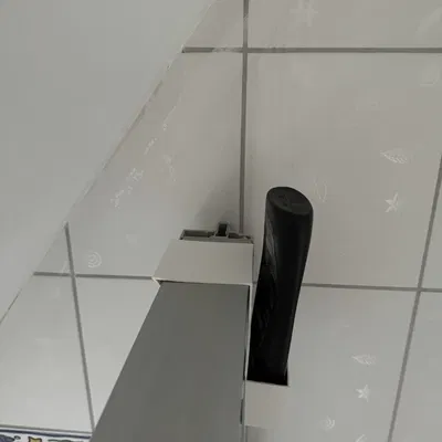 Người giữ chai dầu gội