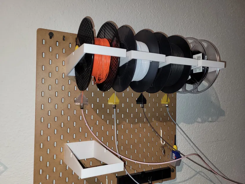 Giá đỡ cuộn dây tự tua Ikea Skadis - Image 2