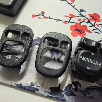 Nắp che nút gập gương Celica t23