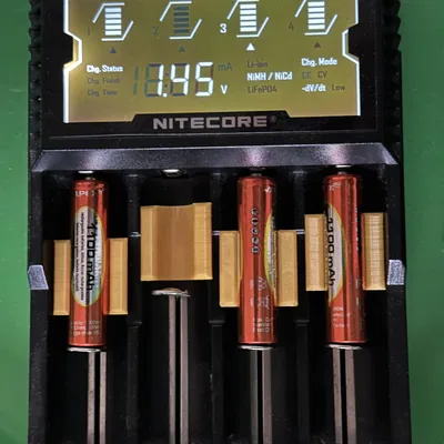 Đế chuyển pin 18650 sang AAA cho sạc Nitecore