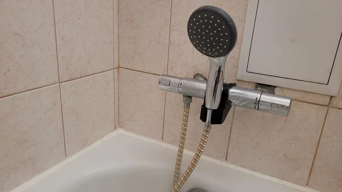 Giá đỡ đầu sen gắn trên vòi sen cây nóng lạnh - Image 1