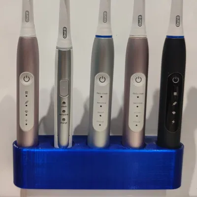 Người giữ bàn chải đánh răng B bằng miệng