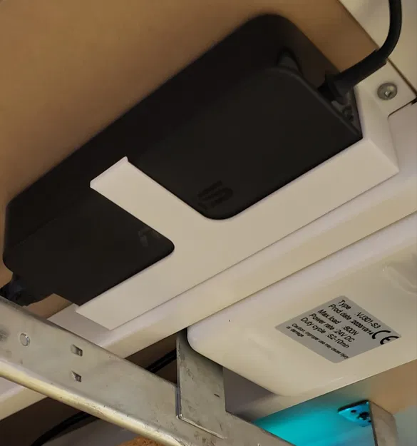 Đế giữ adapter sạc laptop dưới gầm bàn - Image 1