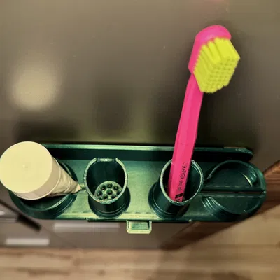 Kệ cho kem đánh răng và bàn chải đánh răng.