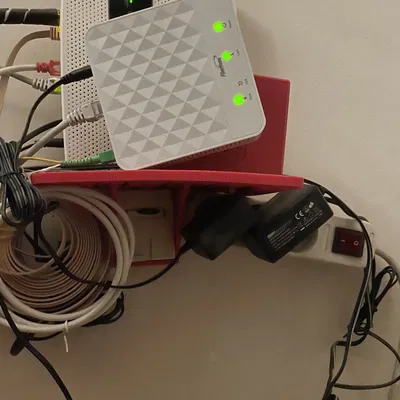 Giá đỡ router dùng hộp điện thoại làm điểm neo