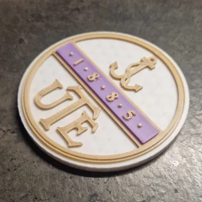 Biểu tượng UTE/Lá cờ Újpest