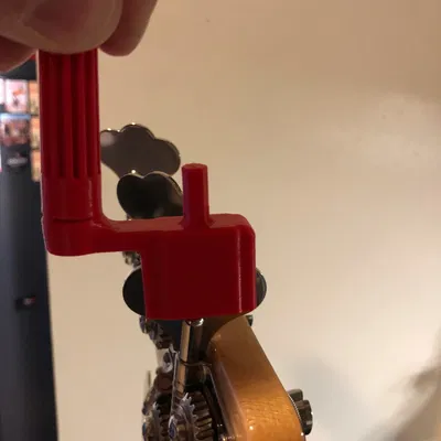 Dụng cụ lên dây đàn Bass/Guitar