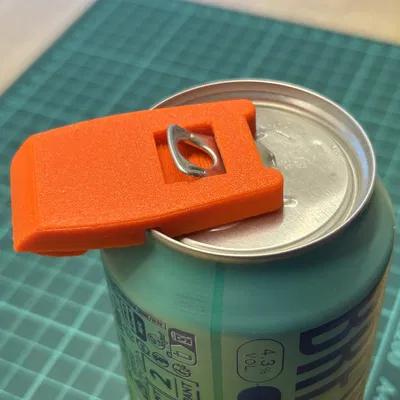 Dụng cụ mở khoen lon nước giải khát và nắp đậy