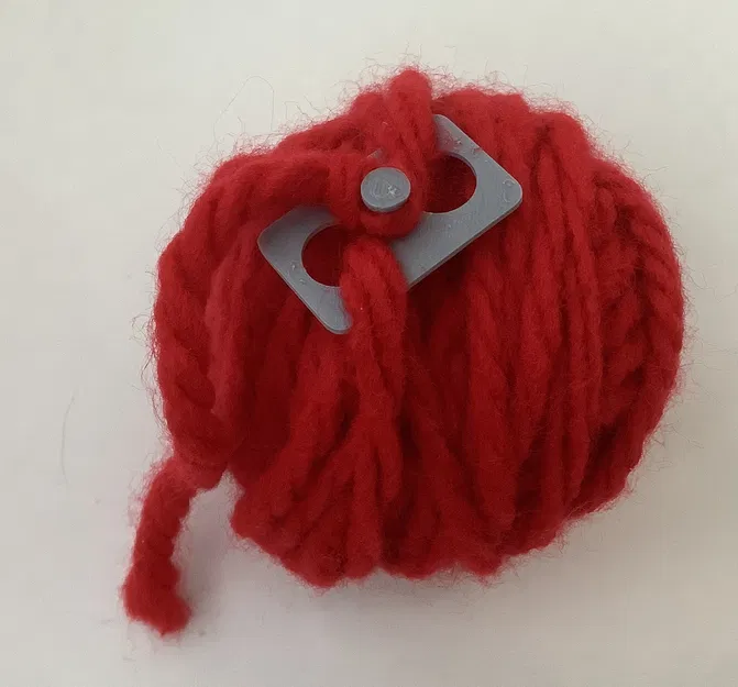 Dụng Cụ Giữ Đuôi Len - Image 1