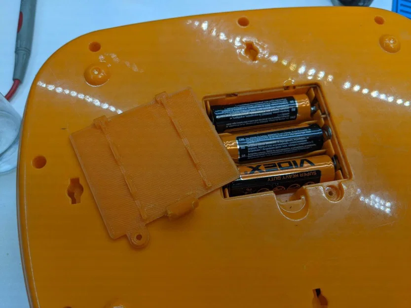 Nắp Pin Cho Laptop Đồ Chơi - Image 1