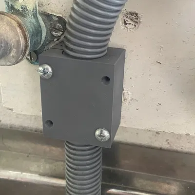 Giá đỡ ống máy giặt