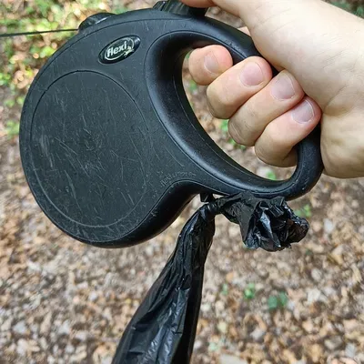 Kẹp túi đựng "phân" dây dắt linh hoạt