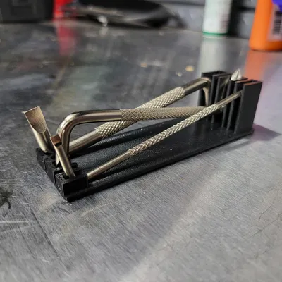 Chân Đế Giữ Tua Vít Góc Vuông / Lệch