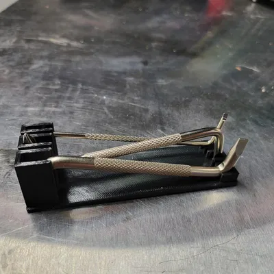 Chân Đế Giữ Tua Vít Góc Vuông / Lệch