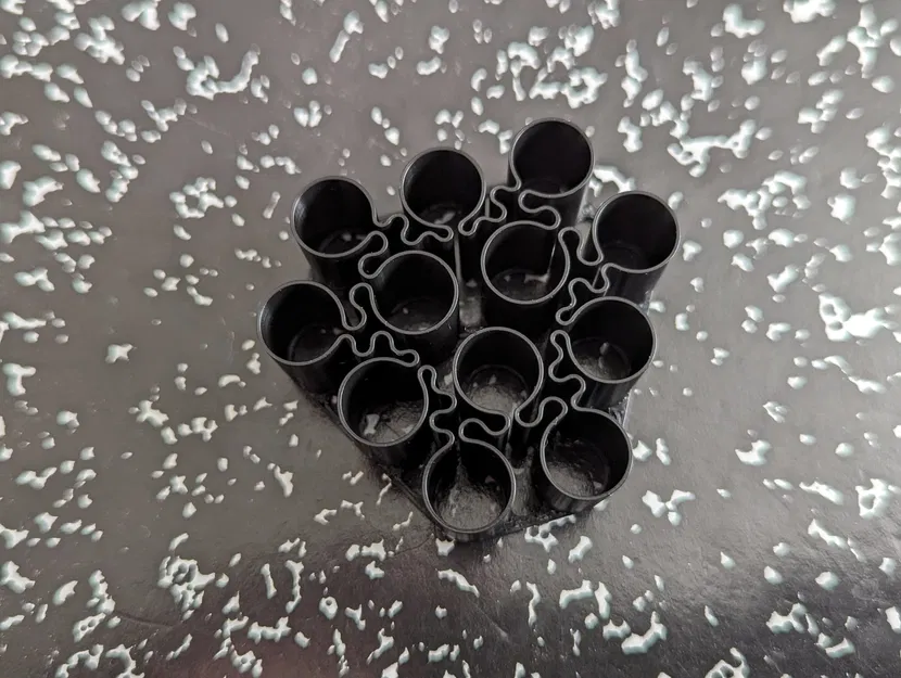 Giá Đựng Pin AAA In Chế Độ Xoắn Ốc - Image 1