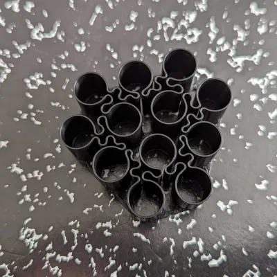 Giá Đựng Pin AAA In Chế Độ Xoắn Ốc