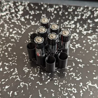 Giá Đựng Pin AAA In Chế Độ Xoắn Ốc