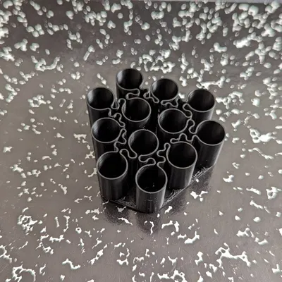 Giá Đựng Pin AAA In Chế Độ Xoắn Ốc