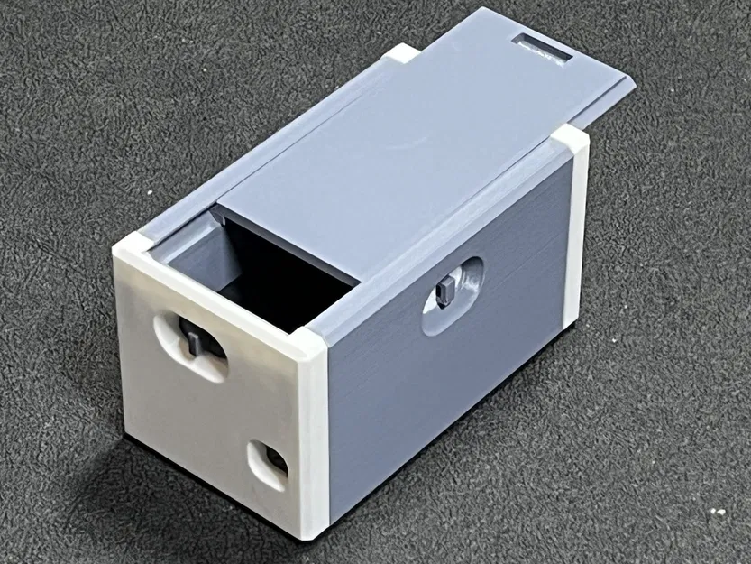 Hộp câu đố nút bấm không keo - Image 1