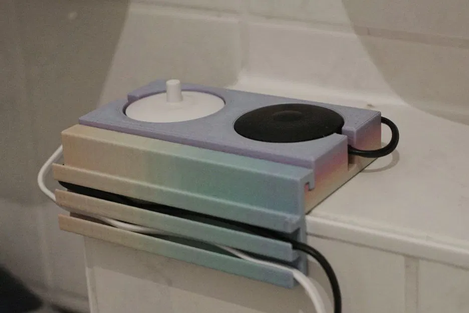 Giá đỡ bàn chải điện Oral-B đôi kiêm bộ tổ chức cáp ép khớp - Image 1