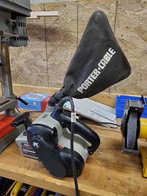 Ống đỡ túi máy chà nhám đai Porter Cable 3x21 - Image 1