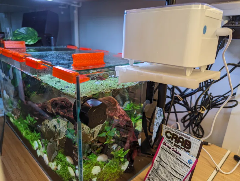 Máng ăn tự động cho hồ cá - Image 1