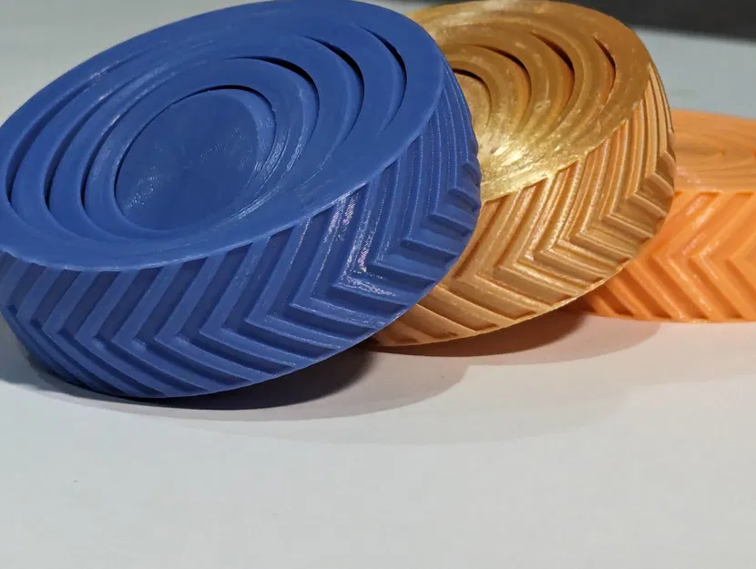 Spinner Hình Tròn Có Họa Tiết Lốp Xe - Image 1