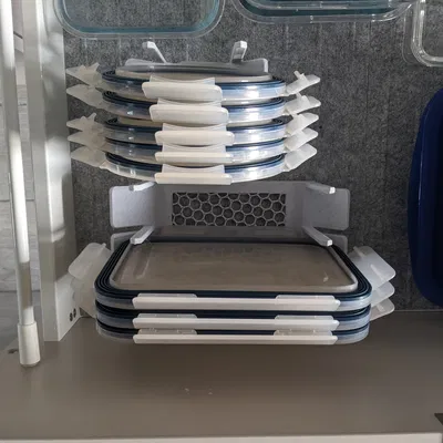 Giá đỡ nắp hộp Tupperware