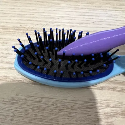 Dụng cụ làm sạch lược chải tóc