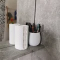 Giá đỡ bông tẩy trang hình con én - Thumbnail 1