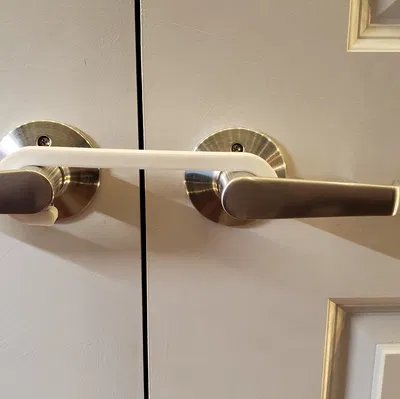 Kẹp Giữ Cửa Tủ Chống Mèo