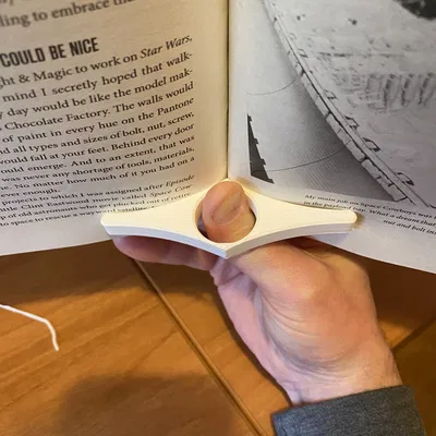 Dụng Cụ Giữ Trang Sách Bằng Nhẫn Đeo Ngón Cái