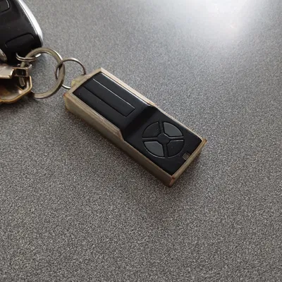 Chân giữ remote mở cửa garage