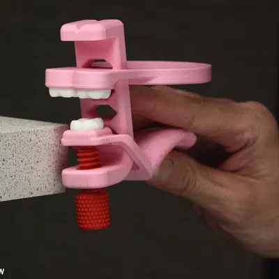 Giá Đỡ Lon Gắn Kẹp Kiểu Răng Khôn